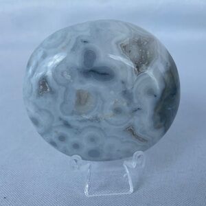 Jaw Dropping 8th Vein Ocean Jasper Palm Stone With Subtle Baby Blue Orbs.
